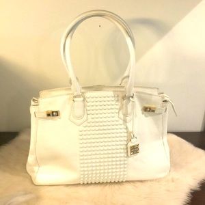 Henri Bendel “souped up” enamel stud satchel